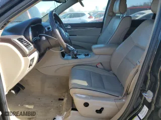 2014 Jeep Grand Cherokee Overland with VIN 1C4RJFCT8EC409673, listed as a Copart auction lot 45271555 with 136,810 mi miles and Salvage Title. Bid and sale history available at carsss.com. Image 7.
