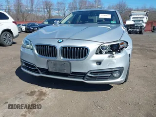 2014 BMW 5 Series 528i xDrive with VIN WBA5A7C58ED617131, listed as a IAAI auction lot 41749651 with 117,954 mi miles and . Bid and sale history available at DreamBid. Image 6.
