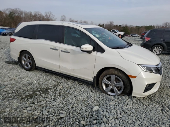 2019 Honda Odyssey EX-L with VIN 5FNRL6H72KB014960, listed as a Copart auction lot 48701035 with 131,921 mi miles and Salvage Title. Bid and sale history available at carsss.com. Image 4.