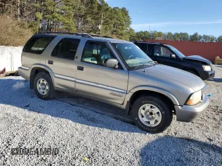 2000 GMC Jimmy SL with VIN 1GKCS13WXY2295240, listed as a Copart auction lot 88526175 with 287,927 mi miles and Salvage Title. Bid and sale history available at carsss.com. Image 4.