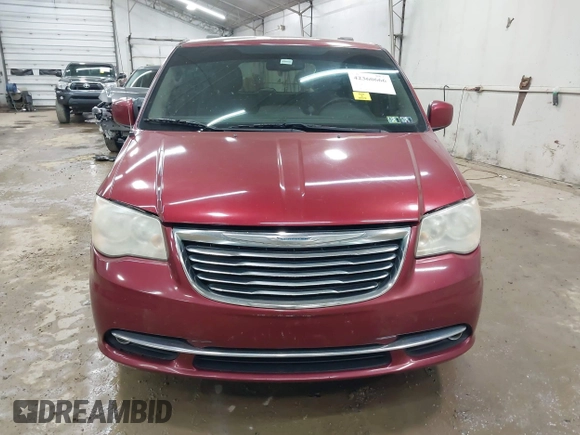 2014 Chrysler Town & Country Touring z VIN 2C4RC1BG9ER438673, wystawiony jako IAAI lot #42360666 z przebiegiem 172 023 mil mil oraz . Historia ofert i sprzedaży dostępna na DreamBid. Obrazek 6.