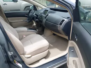 2005 Toyota Prius z VIN JTDKB20U853125464, wystawiony jako IAAI lot #42324259 z przebiegiem 166 742 mil mil oraz . Historia ofert i sprzedaży dostępna na DreamBid. Obrazek 5.