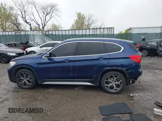 2019 BMW X1 sDrive28i with VIN WBXHU7C5XK5L10933, listed as a IAAI auction lot 41931162 with 55,308 mi miles. Bid and sale history available at carsss.com. Image 14.