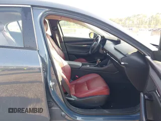 2024 Mazda 3 S Carbon Edition with VIN 3MZBPBCM6RM411828, listed as a IAAI auction lot 42802141 with 40,061 mi miles and . Bid and sale history available at DreamBid. Image 5.
