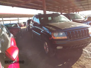 1999 Jeep Grand Cherokee Limited with VIN 1J4GW68N6XC675399, listed as a IAAI auction lot 41745815 with 217,800 mi miles. Bid and sale history available at carsss.com. Image 1.