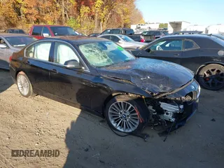 2015 BMW 3 Series 335i xDrive with VIN WBA3B9G58FNR92894, listed as a IAAI auction lot 40661818 with 103,706 mi miles and . Bid and sale history available at DreamBid. Image 1.