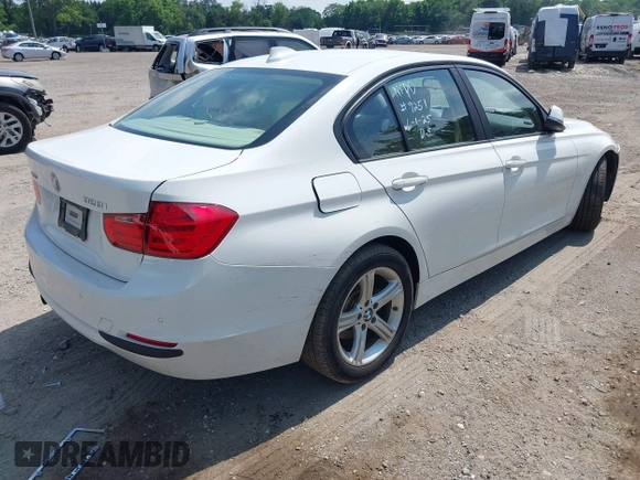 2015 BMW 3 Series 328i xDrive with VIN WBA3B5G56FNS15848, listed as a IAAI auction lot 42537645 with 121,742 mi miles and . Bid and sale history available at DreamBid. Image 4.