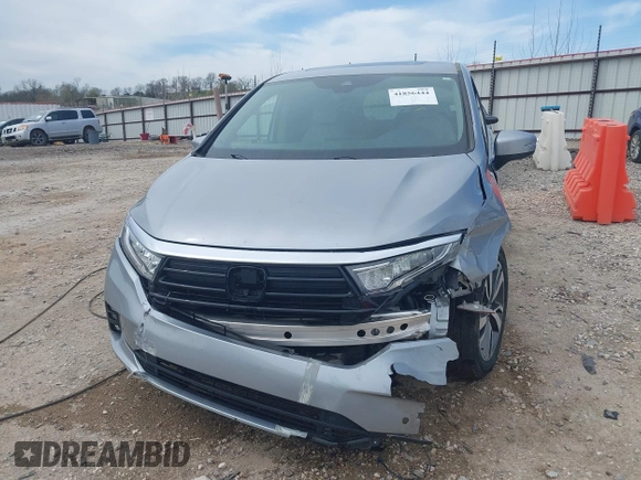 2021 Honda Odyssey Touring with VIN 5FNRL6H8XMB034837, listed as a IAAI auction lot 41856444 with 84,950 mi miles. Bid and sale history available at carsss.com. Image 12.