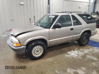 2001 Chevrolet Blazer LS z VIN 1GNCT18WX1K102325, wystawiony jako Copart lot #45460265 z przebiegiem 190 351 mil mil oraz Czysty tytuł • Clean title. Historia ofert i sprzedaży dostępna na DreamBid. Obrazek 1.
