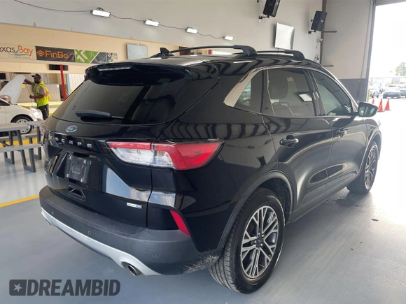 2020 Ford Escape SEL z VIN 1FMCU9H69LUA59992, wystawiony jako IAAI lot #42797223 z przebiegiem 87 913 mil mil oraz . Historia ofert i sprzedaży dostępna na DreamBid. Obrazek 10.