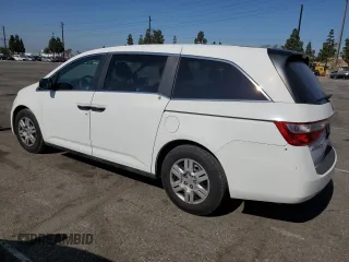 2011 Honda Odyssey LX z VIN 5FNRL5H2XBB054864, wystawiony jako Copart lot #59002395 z przebiegiem 146 987 mil mil oraz Czysty tytuł • Clean title. Historia ofert i sprzedaży dostępna na DreamBid. Obrazek 2.