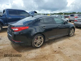 2013 Kia Optima SX z VIN 5XXGR4A65DG215196, wystawiony jako Copart lot #60927695 z przebiegiem 73 164 mil mil oraz Czysty tytuł • Clean title. Historia ofert i sprzedaży dostępna na DreamBid. Obrazek 3.