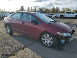 2010 Honda Civic Sdn LX with VIN 2HGFA1F55AH577203, listed as a Copart auction lot 53259215 with 179,834 mi miles and Salvage Title. Bid and sale history available at carsss.com. Image 4.