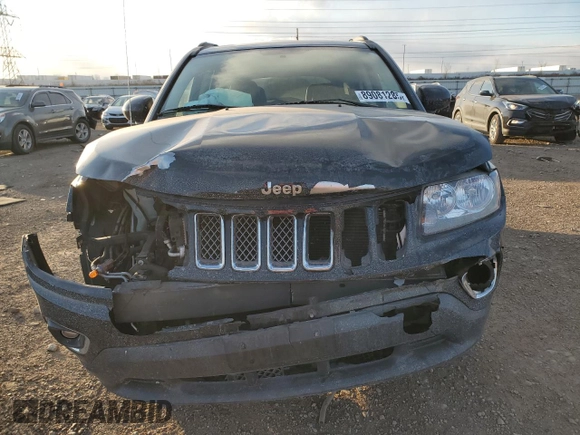 2014 Jeep Compass High Altitude with VIN 1C4NJCEAXED680799, listed as a Copart auction lot 89081285 with 63,447 mi miles and Salvage Title. Bid and sale history available at carsss.com. Image 5.