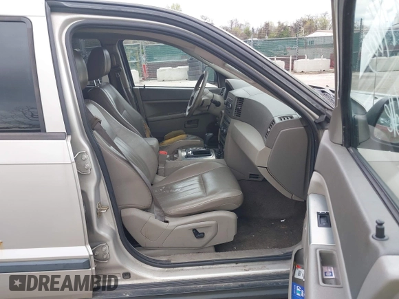 2007 Jeep Grand Cherokee Laredo z VIN 1J8HR48P77C548578, wystawiony jako IAAI lot #41974603 z przebiegiem 179 280 mil mil oraz . Historia ofert i sprzedaży dostępna na DreamBid. Obrazek 5.