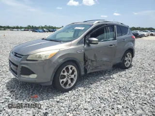 2013 Ford Escape Titanium z VIN 1FMCU0J94DUA70500, wystawiony jako Copart lot #61977195 z przebiegiem 121 165 mil mil oraz Szkoda całkowita • Salvage title. Historia ofert i sprzedaży dostępna na DreamBid. Obrazek 1.