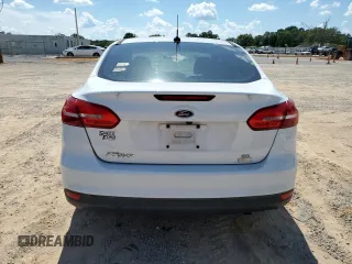 2017 Ford Focus SE with VIN 1FADP3FE9HL348123, listed as a Copart auction lot 64624965 with 58,650 mi miles and Clean title. Bid and sale history available at DreamBid. Image 6.