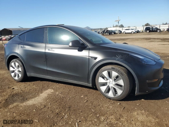 2023 Tesla Model Y Long Range with VIN 7SAYGAEE3PF833458, listed as a Copart auction lot 41800135 with 44,471 mi miles and Salvage Title. Bid and sale history available at carsss.com. Image 4.