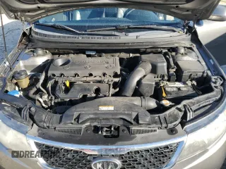 2012 Kia Forte SX с VIN KNAFW5A3XC5518104, выставлен на аукционе Copart как лот 42579785 с пробегом 130 111 миль миль и Списание • Salvage title. История ставок и продаж доступна на DreamBid. Изображение 12.