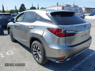 2022 Lexus RX with VIN 2T2AZMAAXNC228573, listed as a IAAI auction lot 41976051 with 22,784 mi miles. Bid and sale history available at carsss.com. Image 3.