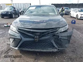 2018 Toyota Camry LE z VIN 4T1B11HK5JU649736, wystawiony jako IAAI lot #41536240 z przebiegiem 20 330 mil mil oraz . Historia ofert i sprzedaży dostępna na DreamBid. Obrazek 6.