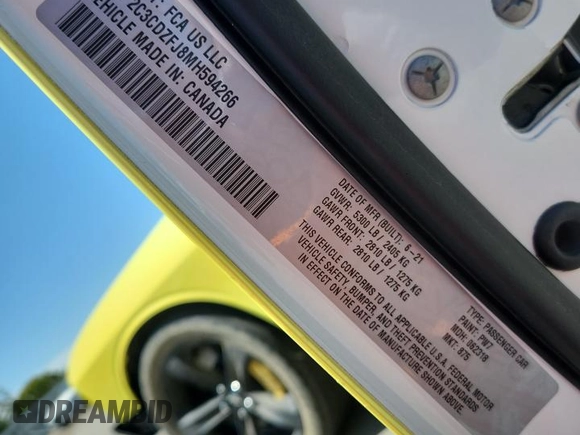 2021 Dodge Challenger R/T Scat Pack Widebody z VIN 2C3CDZFJ8MH594266, wystawiony jako Copart lot #56887575 z przebiegiem 28 748 mil mil oraz Szkoda całkowita • Salvage title. Historia ofert i sprzedaży dostępna na DreamBid. Obrazek 13.