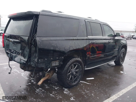 2017 Chevrolet Suburban Premier with VIN 1GNSKJKC4HR162261, listed as a IAAI auction lot 41593672 with 100,136 mi miles. Bid and sale history available at carsss.com. Image 4.