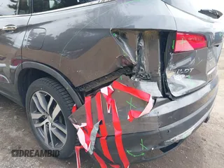 2017 Honda Pilot Touring with VIN 5FNYF6H92HB012090, listed as a IAAI auction lot 41882542 with 110,179 mi miles and . Bid and sale history available at DreamBid. Image 6.
