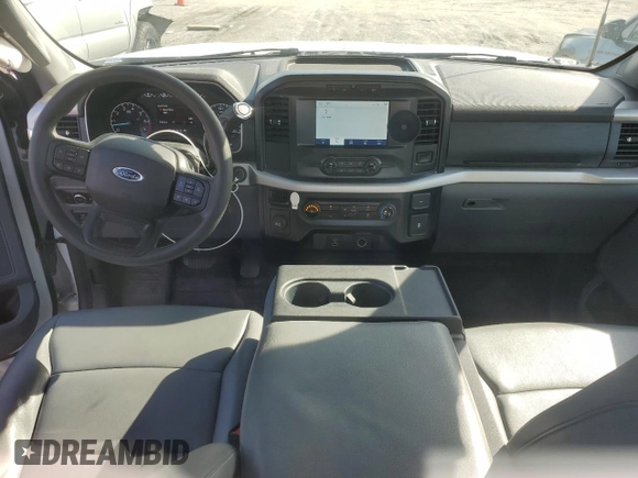 2021 Ford F-150 XL with VIN 1FTMF1CP5MKE21303, listed as a Copart auction lot 56406605 with 93,906 mi miles and Salvage title. Bid and sale history available at DreamBid. Image 8.