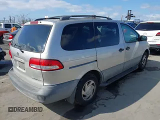 2001 Toyota Sienna LE with VIN 4T3ZF13C21U352205, listed as a IAAI auction lot 41904160 with 185,293 mi miles. Bid and sale history available at carsss.com. Image 4.