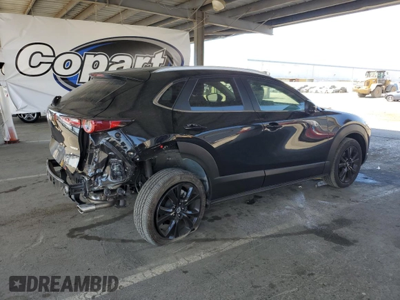 2024 Mazda CX-30 S Select Sport with VIN 3MVDMBBM8RM658675, listed as a Copart auction lot 61963635 with 8,497 mi miles and Salvage title. Bid and sale history available at DreamBid. Image 3.