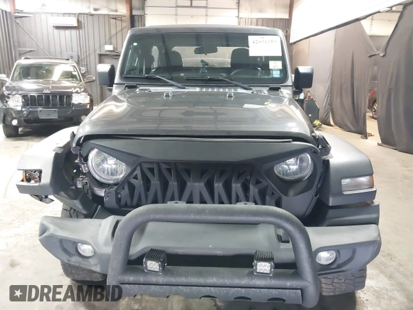 2021 Jeep Wrangler Sport S with VIN 1C4HJXAG2MW502452, listed as a IAAI auction lot 42031159 with 87,952 mi miles and . Bid and sale history available at DreamBid. Image 12.