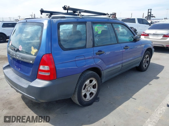 2003 Subaru Forester X with VIN JF1SG63643H709954, listed as a IAAI auction lot 42034404 with 193,026 mi miles. Bid and sale history available at carsss.com. Image 4.