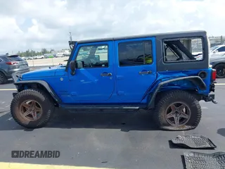 2015 Jeep Wrangler Unlimited Sport with VIN 1C4BJWDG1FL716400, listed as a IAAI auction lot 42645745 with 83,199 mi miles and . Bid and sale history available at DreamBid. Image 15.