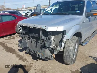 2014 Ford F-150 XL with VIN 1FTEW1CM9EFC50155, listed as a IAAI auction lot 41302506 with 212,439 mi miles. Bid and sale history available at carsss.com. Image 6.