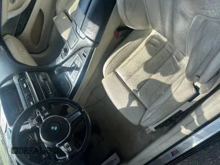 2014 BMW 6 Series 650i with VIN WBAYP9C54ED169297, listed as a Copart auction lot 56227155 with 123,829 mi miles and Clean Title. Bid and sale history available at carsss.com. Image 9.