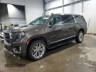 2021 GMC Yukon XL SLT with VIN 1GKS2GKD1MR434218, listed as a Copart auction lot 82777494 with 60,601 mi miles and Salvage Title. Bid and sale history available at carsss.com. Image 1.