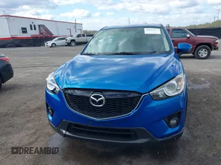 2013 Mazda CX-5 Grand Touring with VIN JM3KE4DE4D0123837, listed as a IAAI auction lot 42031074 with 121,818 mi miles. Bid and sale history available at carsss.com. Image 13.
