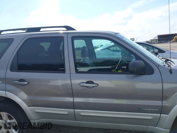 2007 Ford Escape Hybrid with VIN 1FMCU49H47KA90605, listed as a IAAI auction lot 42093591 with 136,924 mi miles and . Bid and sale history available at DreamBid. Image 13.