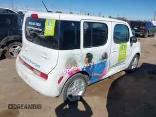 2013 Nissan Cube SL z VIN JN8AZ2KR2DT304862, wystawiony jako IAAI lot #41615949 z przebiegiem 138 354 mil mil oraz . Historia ofert i sprzedaży dostępna na DreamBid. Obrazek 4.