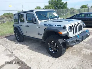 2023 Jeep Wrangler Rubicon z VIN 1C4JJXR63PW703424, wystawiony jako IAAI lot #42639653 z przebiegiem 46 412 mil mil oraz . Historia ofert i sprzedaży dostępna na DreamBid. Obrazek 1.