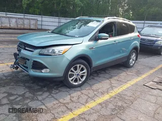 2013 Ford Escape Titanium with VIN 1FMCU9J99DUD63037, listed as a IAAI auction lot 42436605 with 168,200 mi miles and . Bid and sale history available at DreamBid. Image 2.