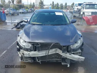 2017 Honda Civic LX z VIN 2HGFC2F50HH540361, wystawiony jako IAAI lot #41809159 z przebiegiem 96 590 mil mil oraz . Historia ofert i sprzedaży dostępna na DreamBid. Obrazek 13.
