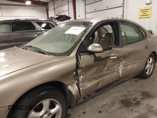 2003 Ford Taurus SES Standard with VIN 1FAFP552X3G184894, listed as a IAAI auction lot 41846677 with 160,824 mi miles. Bid and sale history available at carsss.com. Image 6.