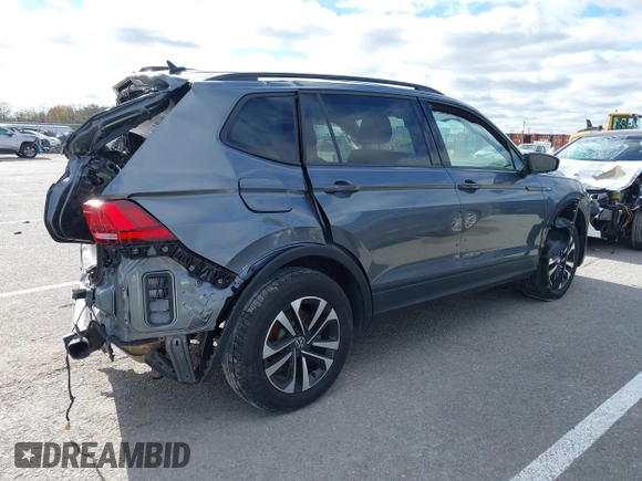 2023 Volkswagen Tiguan S with VIN 3VVRB7AXXPM033845, listed as a IAAI auction lot 40918862 with 38,122 mi miles and . Bid and sale history available at DreamBid. Image 4.