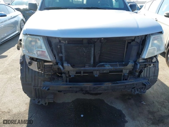 2014 Nissan Frontier SV with VIN 1N6AD0ER1EN720642, listed as a IAAI auction lot 41006979 with 157,477 mi miles. Bid and sale history available at carsss.com. Image 6.