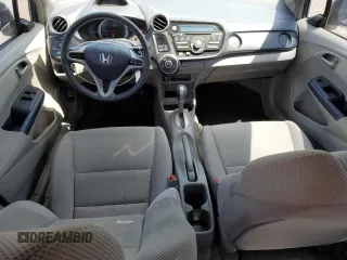 2010 Honda Insight LX z VIN JHMZE2H56AS008077, wystawiony jako Copart lot #60522045 z przebiegiem 105 936 mil mil oraz Szkoda całkowita • Salvage title. Historia ofert i sprzedaży dostępna na DreamBid. Obrazek 8.