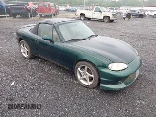 2002 Mazda MX-5 Miata Cloth z VIN JM1NB353120227088, wystawiony jako IAAI lot #42523129 z przebiegiem 202 290 mil mil oraz . Historia ofert i sprzedaży dostępna na DreamBid. Obrazek 1.
