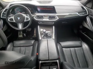 2021 BMW X6 M50i z VIN 5UXCY8C04M9D98591, wystawiony jako Copart lot #60606155 z przebiegiem 90 639 mil mil oraz Czysty tytuł • Clean title. Historia ofert i sprzedaży dostępna na DreamBid. Obrazek 8.