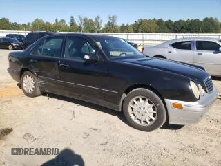 2000 Mercedes-Benz E-Class AWD with VIN WDBJF82JXYX035315, listed as a Copart auction lot 75568454 with 166,704 mi miles and Salvage Title. Bid and sale history available at carsss.com. Image 4.
